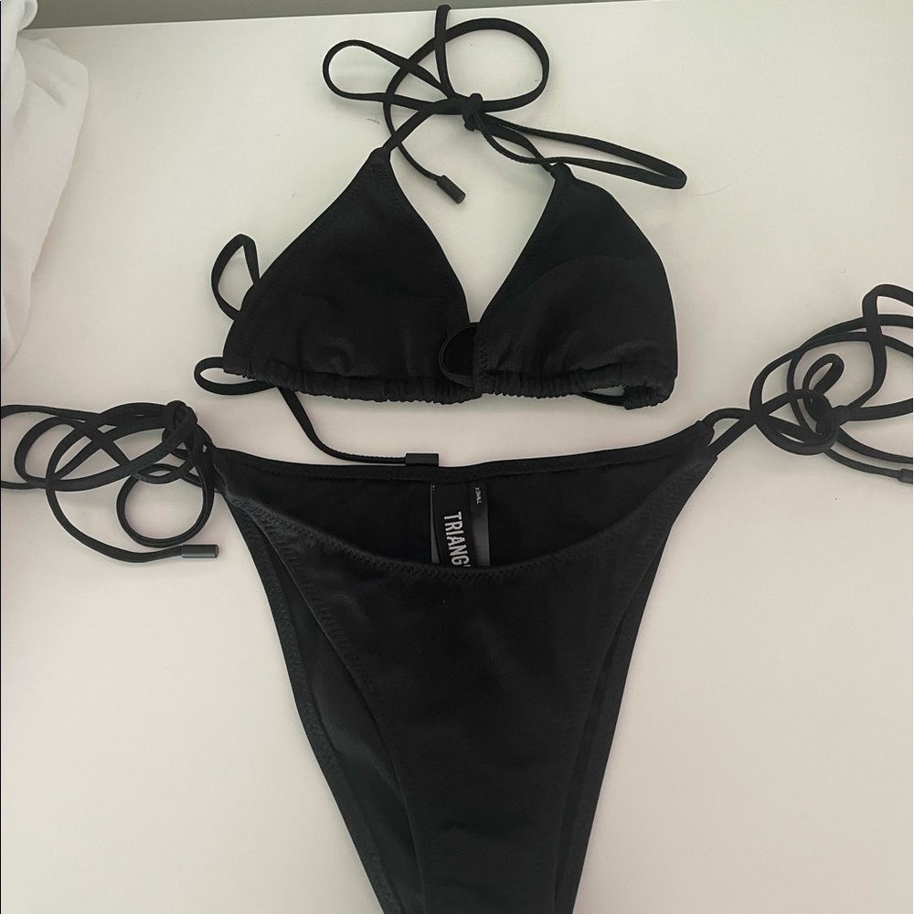 Black never worn triangl suit!